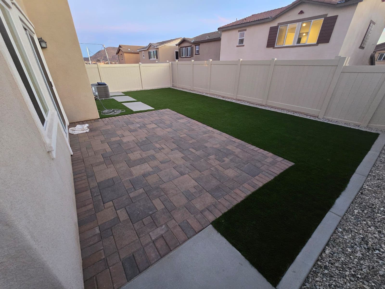 Artificial turf installation in a drought-friendly California yard